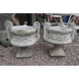 Pair of stone pedestal planters