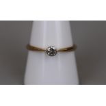 18ct gold diamond solitaire ring - Approx size: S