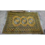 Gold patterned Afghan rug - Approx size: 160cm x 102cm