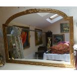 Large late 20th century over mantle mirror in a gilt frame