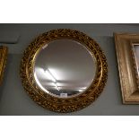 Round gilt framed mirror with beveled glass