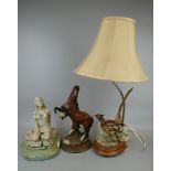 2 figures and a lamp