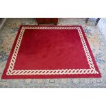 Red patterned rug - Approx size: 224cm x 192cm