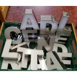 White and chrome letters