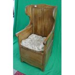Early pine armchair