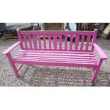 Pink wooden garden bench