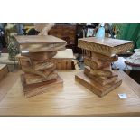 2 heavy carved wooden book themed side tables