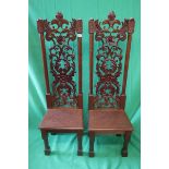 Pair of carved hall chairs