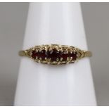 Gold garnet set ring - Approx size: R½