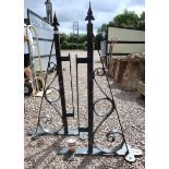 2 large cast iron brackets