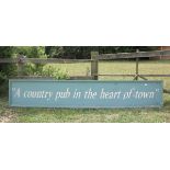 A large Country Pub in Town sign - Approx size: 300cm x 54cm