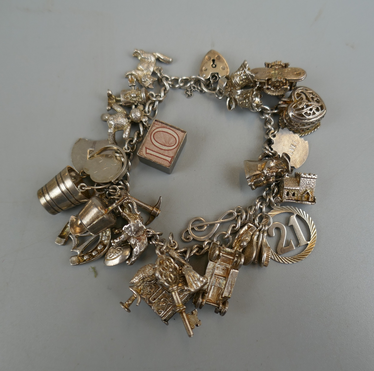 Silver charm bracelet - Approx weight: 71g