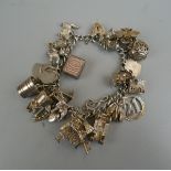 Silver charm bracelet - Approx weight: 71g