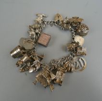 Silver charm bracelet - Approx weight: 71g