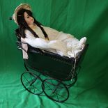 Late 19th century dolls pram with doll