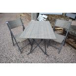 Folding rattan table with 2 chairs