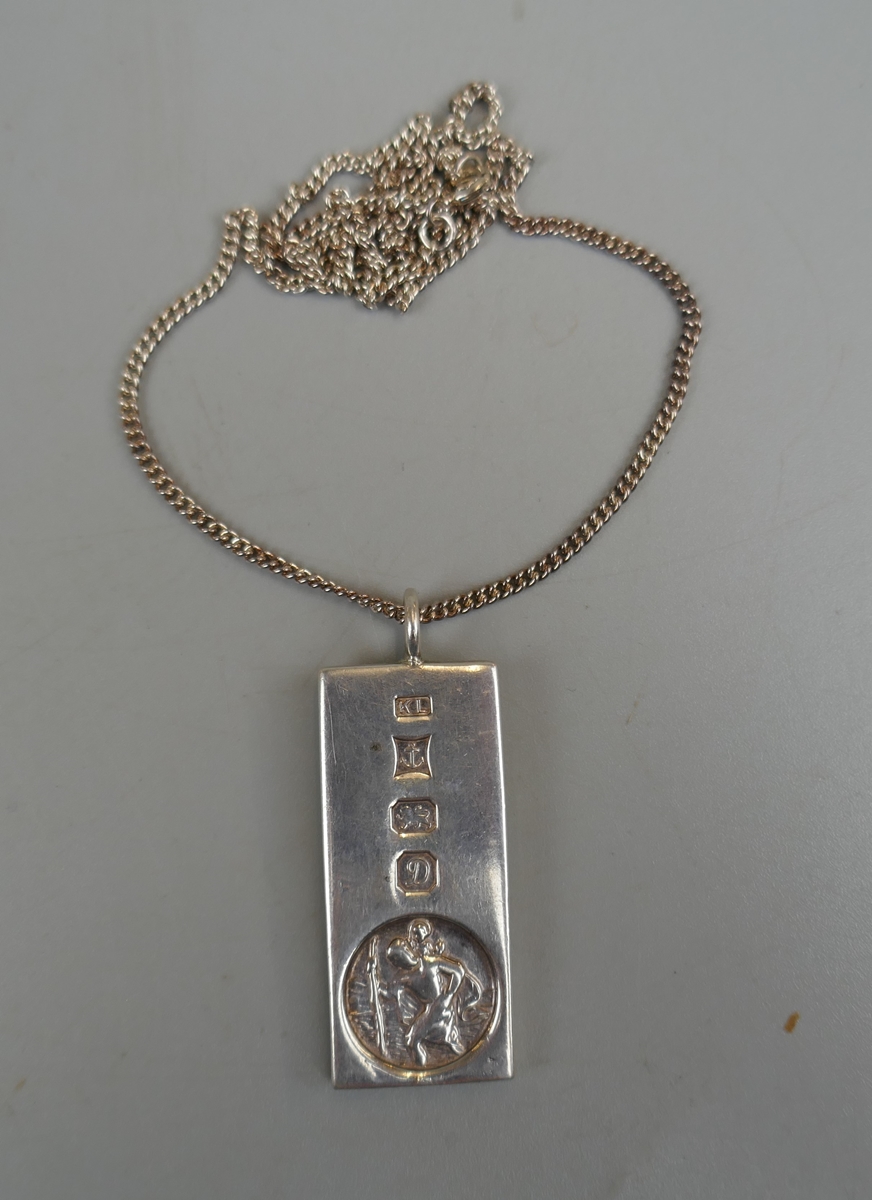 Silver ingot on chain