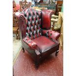 Ox blood leather wing-back armchair