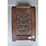 Carved oak wall cabinet