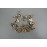Silver charm bracelet - Approx weight: 73g