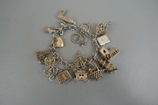 Silver charm bracelet - Approx weight: 73g