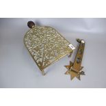 Brass trivet and spit jack bracket