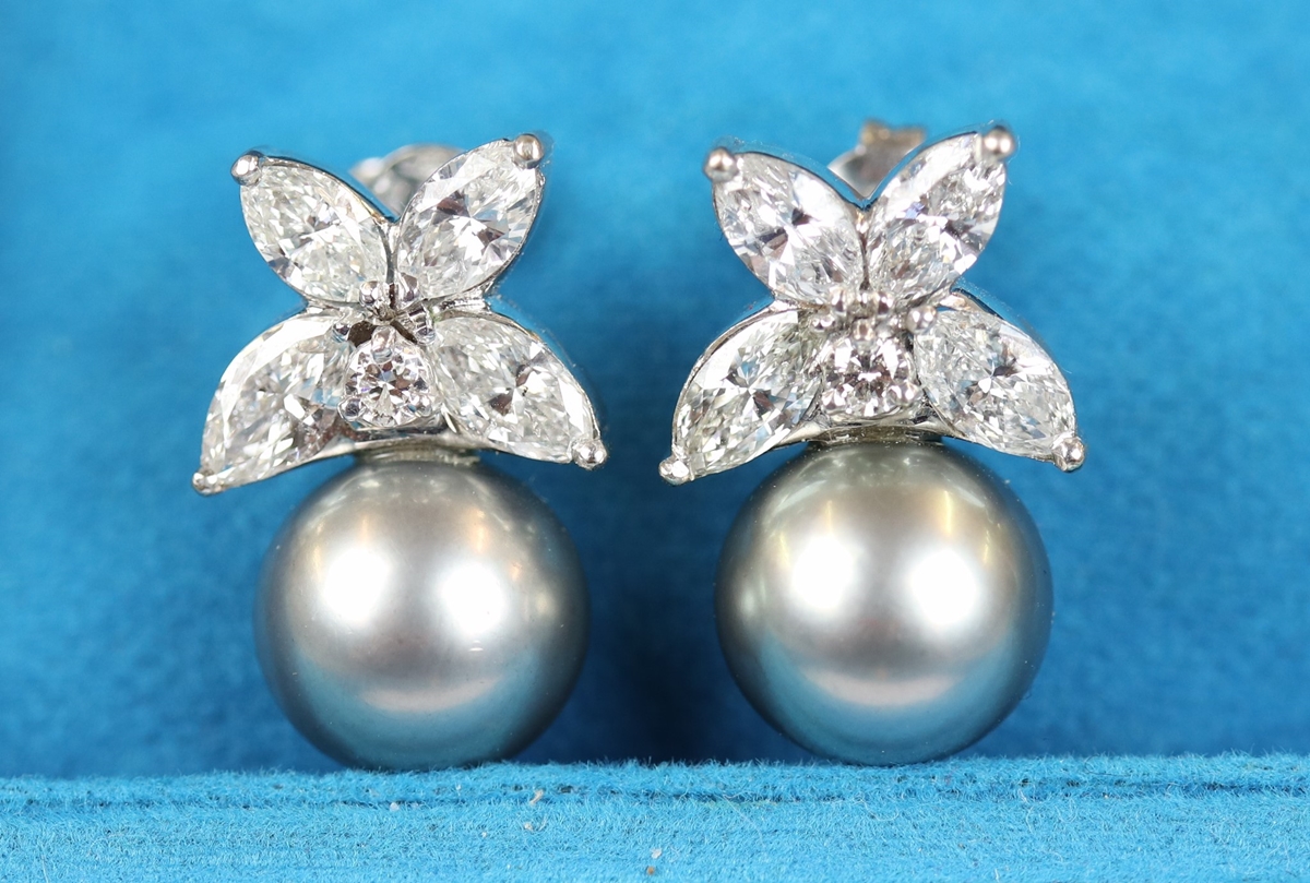 Fine pair of 18ct white gold earrings set with marquise diamonds & pearls