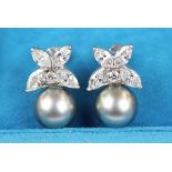 Fine pair of 18ct white gold earrings set with marquise diamonds & pearls