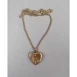 Gold locket on chain - Approx overall weight 5.1g