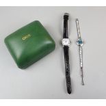 A ladies Oris watch together with a ladies Citizen watch