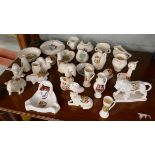 Collection of crested ware mostly from the Malvern area to include animals vases etc