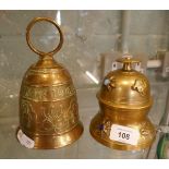 Claw bell on stand together with another bell