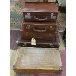 4 vintage suitcases and a vintage laundry box