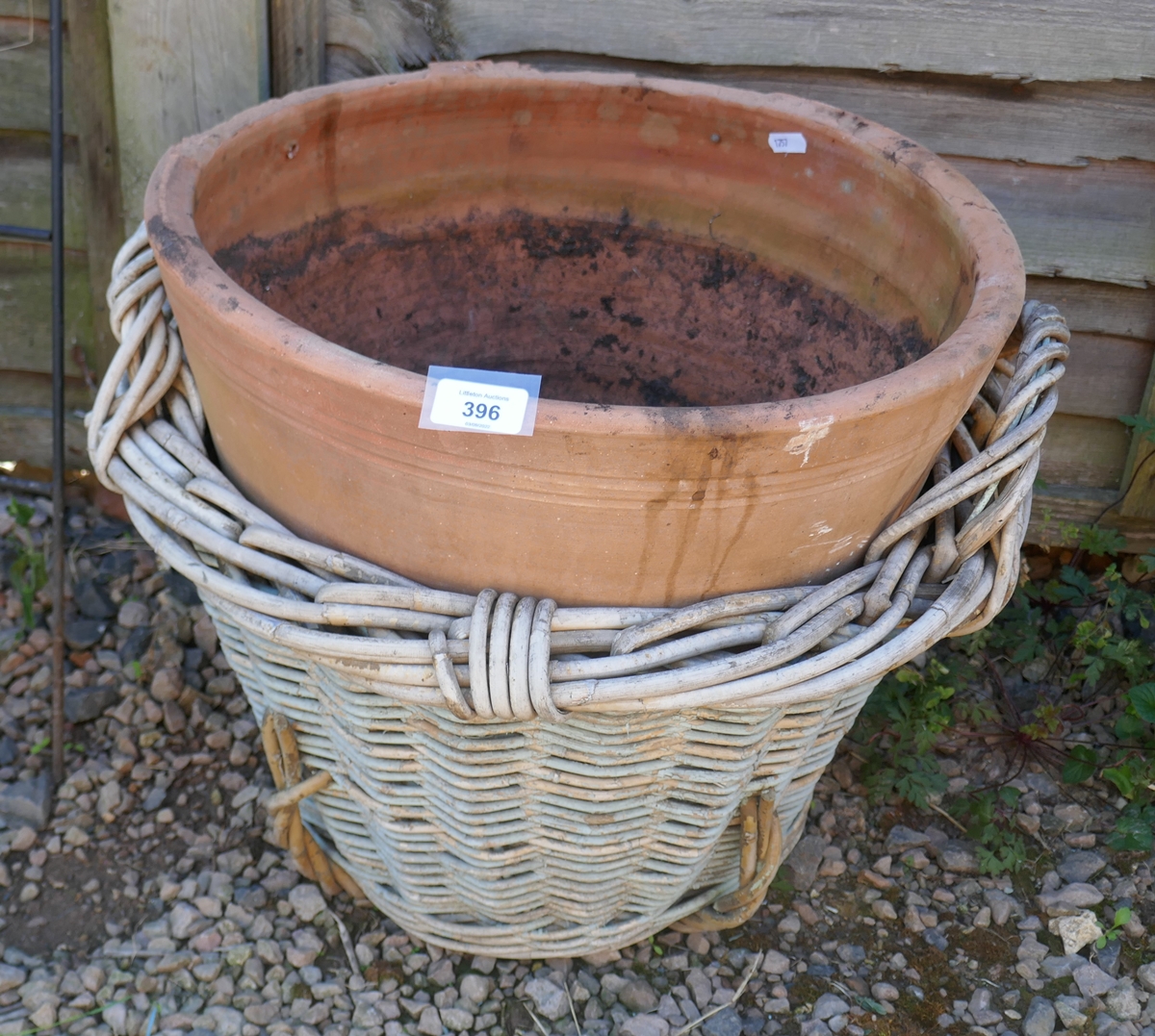 Terracotta pot in basket