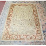 Orange patterned rug - Approx size: 230cm x 164cm