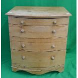 Small pine bow front chest of drawers