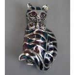 Silver enamel and ruby eyed cat brooch / pendant