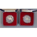 Two silver-proof 1977 silver jubilee coins with C.O.A's