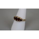 Gold 5 stone garnet ring - Approx size: P