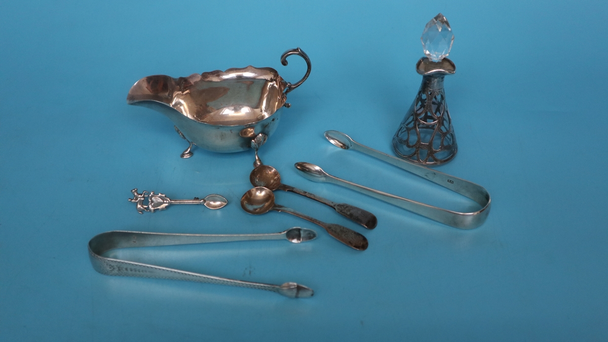 Collection of silver to include sugar tongs and perfume bottle