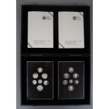 Two sets of silver proof 2008 British coins emblems of Britain's and Royal Shield of Arms in case