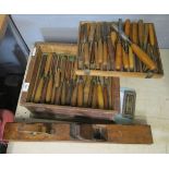 Approx 70 chisels and a wood plane