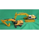 2 die cast excavators - CAT and Komatsu