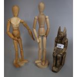 2 articulated wooden models together with an Egyptian figurine