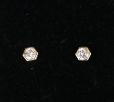 Pair of gold stud earrings