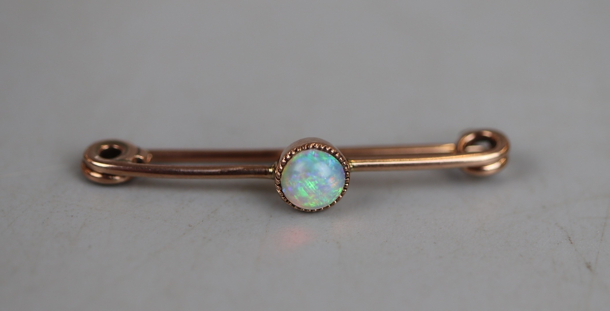 Gold and opal bar brooch