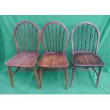 Pair of Ercol stick-back dining chairs together with another