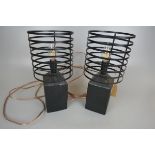 Pair of black industrial style lamps