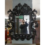 Large ornately carved wooden mirror - Approx size: 90cm x 107cm