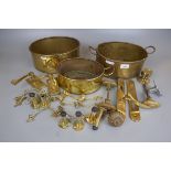 Collection of brass door handles and brass pots